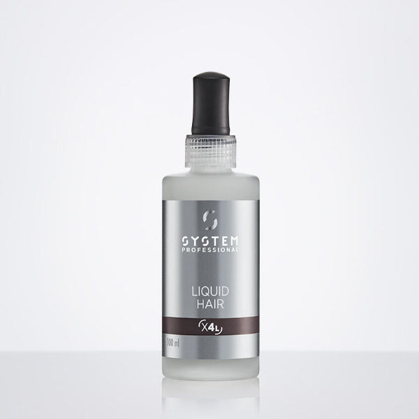 Bottle of System Professional Liquid Hair on a white background