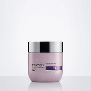 Purple hair mask jar with silver lid on a white background