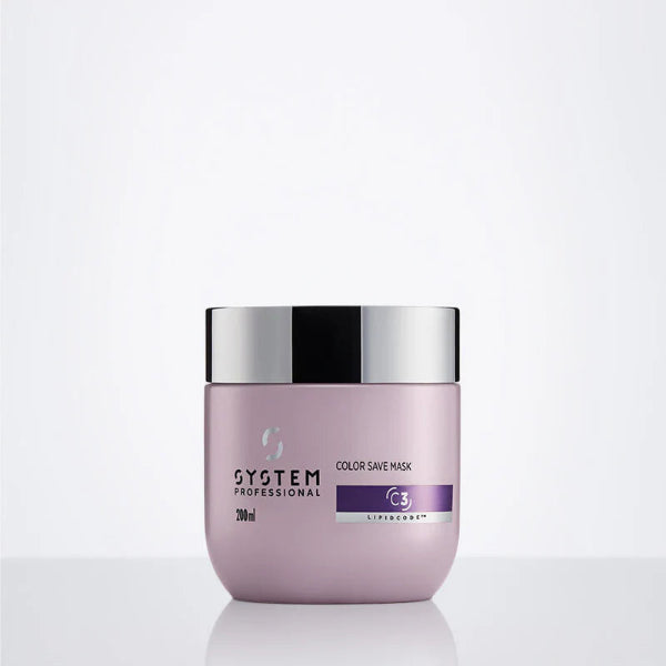 Purple hair mask jar with silver lid on a white background