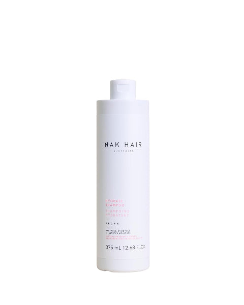 Nak Hair shampoo bottle on a white background