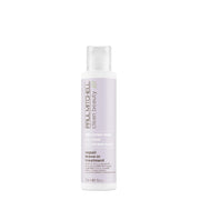 Bottle of Paul Mitchell repair leave-in treatment on a white background