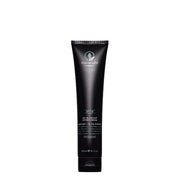 Black hair care product tube with brand name on a white background