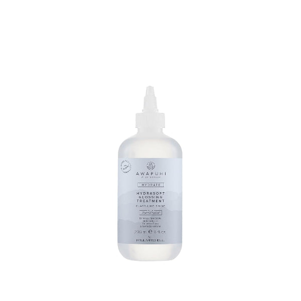 Bottle of Awapuhi hair product on a white background