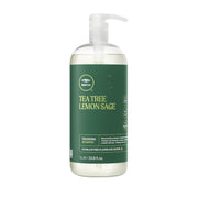 Tea Tree Lemon Sage shampoo bottle with green label on a white background