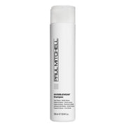 White shampoo bottle with 'Paul Mitchell' branding on a white background