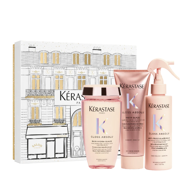 Kérastase hair care products including bottles and a box on a white background