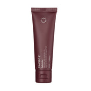 Maroon tube of Davroe Rebuilder hair treatment on a white background
