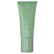 Green tube of Davroe Curluxe Curl Balm on a white background