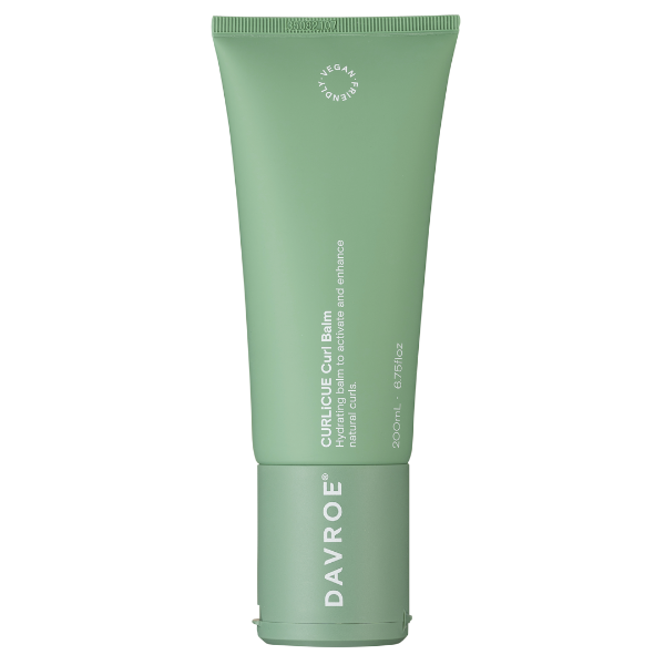 Green tube of Davroe Curluxe Curl Balm on a white background
