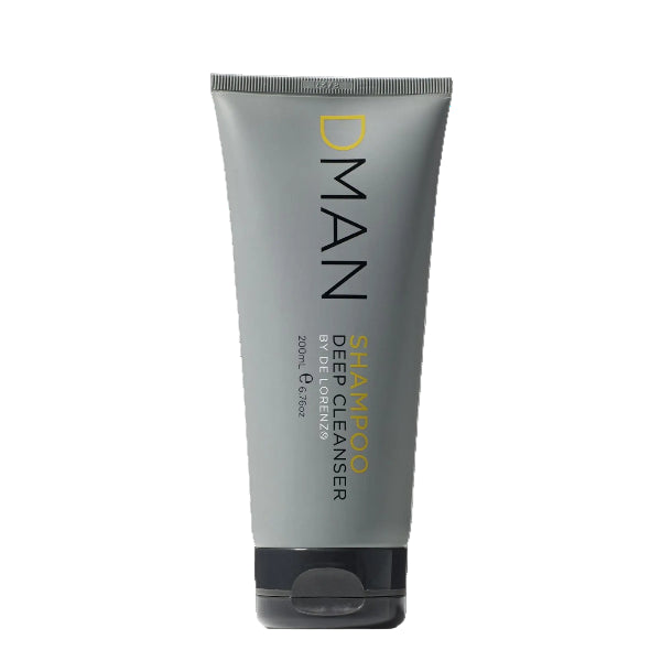 Gray tube of D'MAN shampoo on a white background