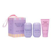 Nak Hair Blonde Plus Signature Mini Set with shampoo, conditioner, and moisturizer on a white background