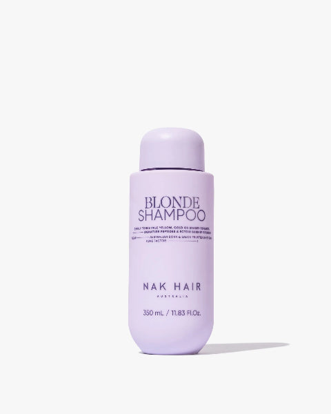 Nak Hair Blonde Shampoo bottle on a white background