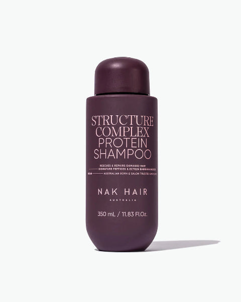 Nak Hair Structure Complex Protein Shampoo bottle on a white background
