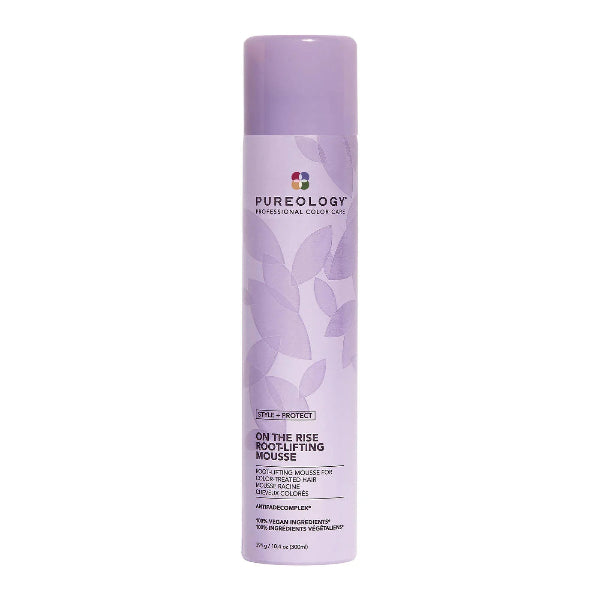 Purple bottle of Pureology mousse on a white background
