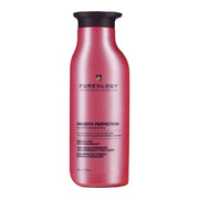 Pink shampoo bottle with black cap labeled 'Pureology Smooth Perfection' on a white background