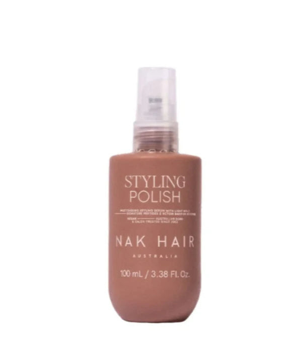 Bottle of Nak Hair Styling Polish on a white background