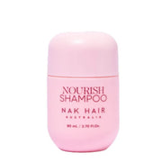 Pink shampoo bottle labeled 'Nourish Shampoo' by 'Nak Hair Australia' on a white background