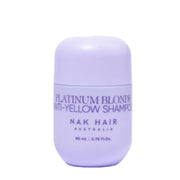 Purple shampoo bottle labeled 'Platinum Blonde Anti-Yellow Shampoo' by Nak Hair Australia on a white background