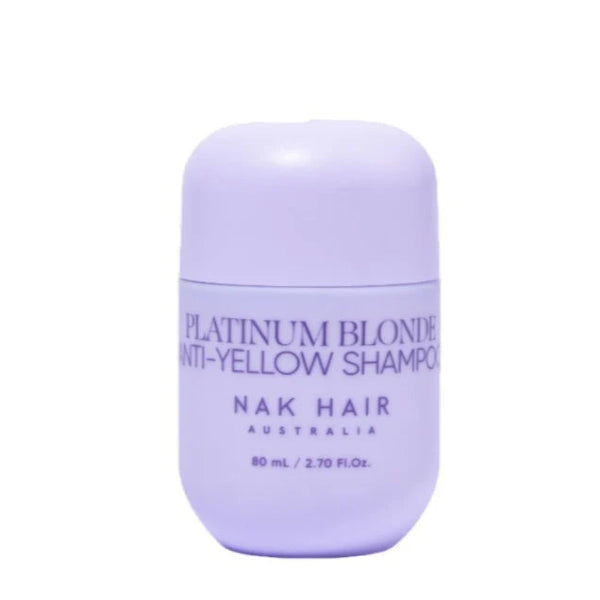 Purple shampoo bottle labeled 'Platinum Blonde Anti-Yellow Shampoo' by Nak Hair Australia on a white background