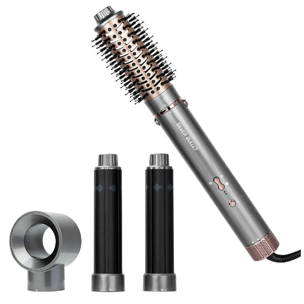 Hair styling tool with interchangeable attachments on a white background