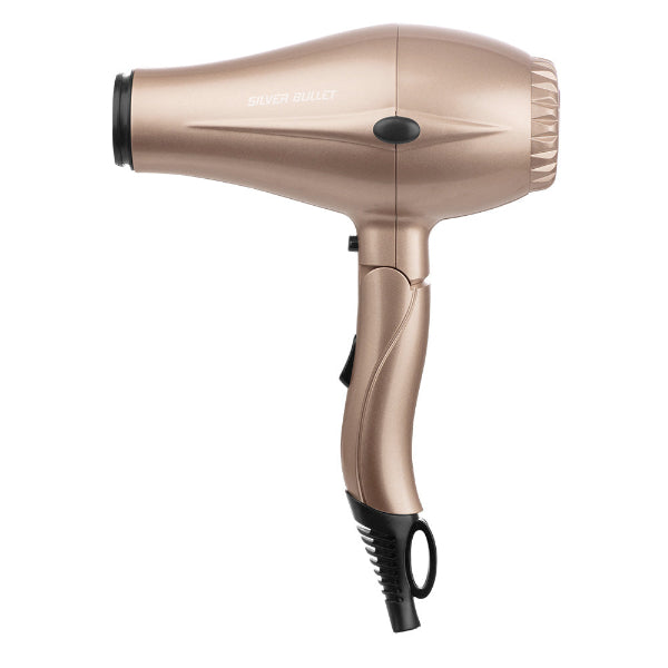 Rose gold hair dryer on a white background