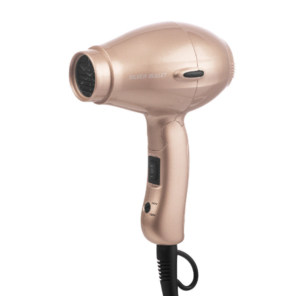 Rose gold hair dryer on a white background