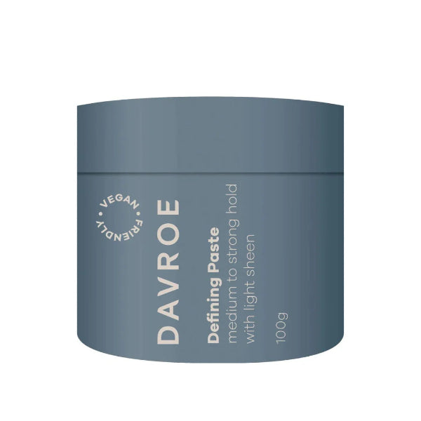 Blue jar of Davroe Defining Paste on a white background