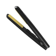 Black hair straightener with gold accents on a white background
