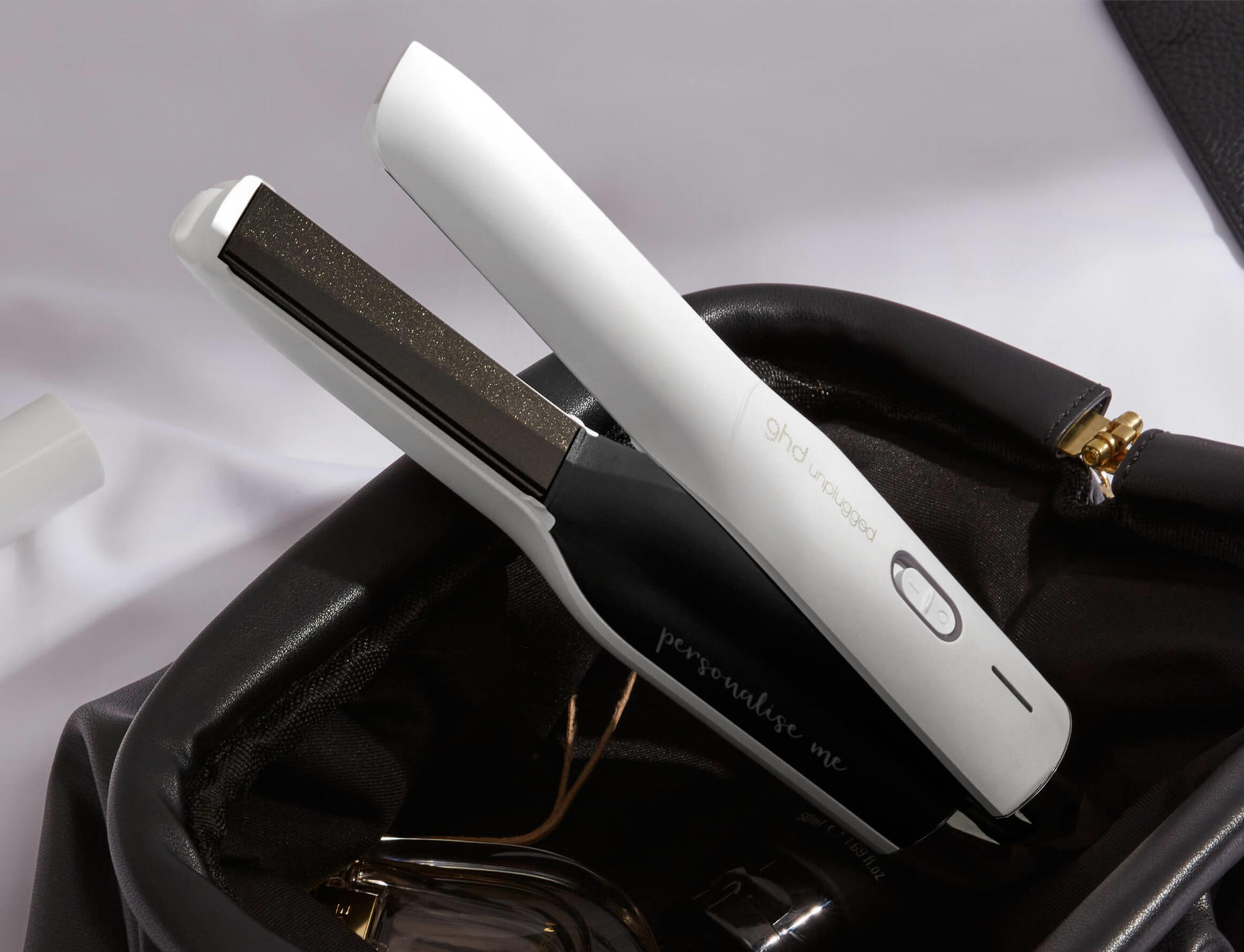 GHD unplugged cordless hair straightener in matte White